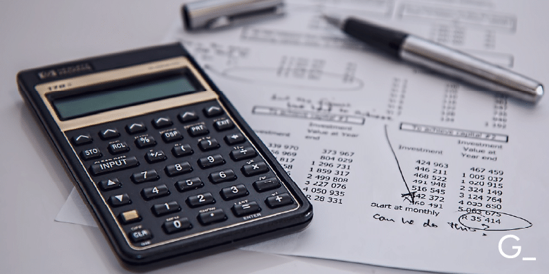 Documents with pencil and calculator